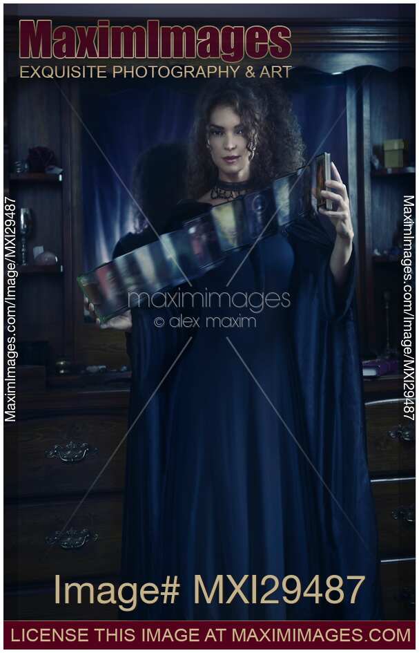 Woman Tarot card reader shuffling cards