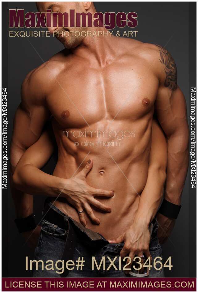 Woman Touching muscular Man's Body