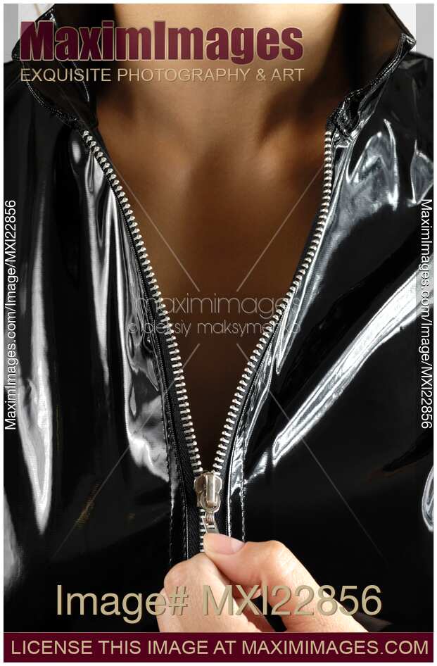 Woman Unzipping Her Jacket