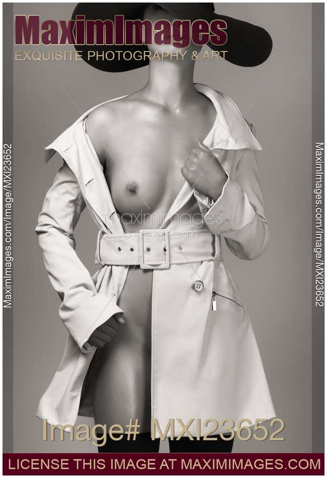 Woman Wearing Trench Coat over Naked Body