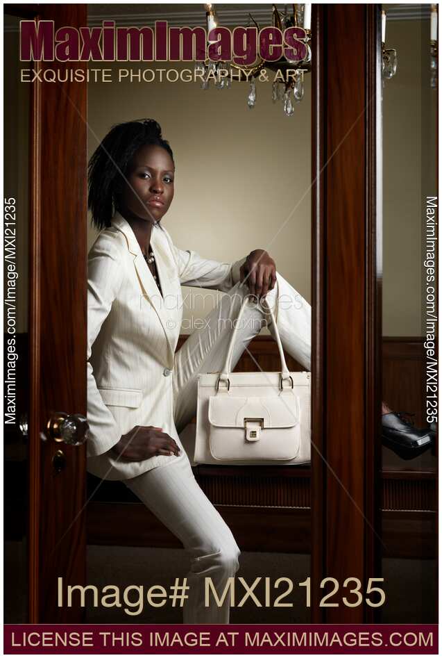 Woman Wearing White Suit