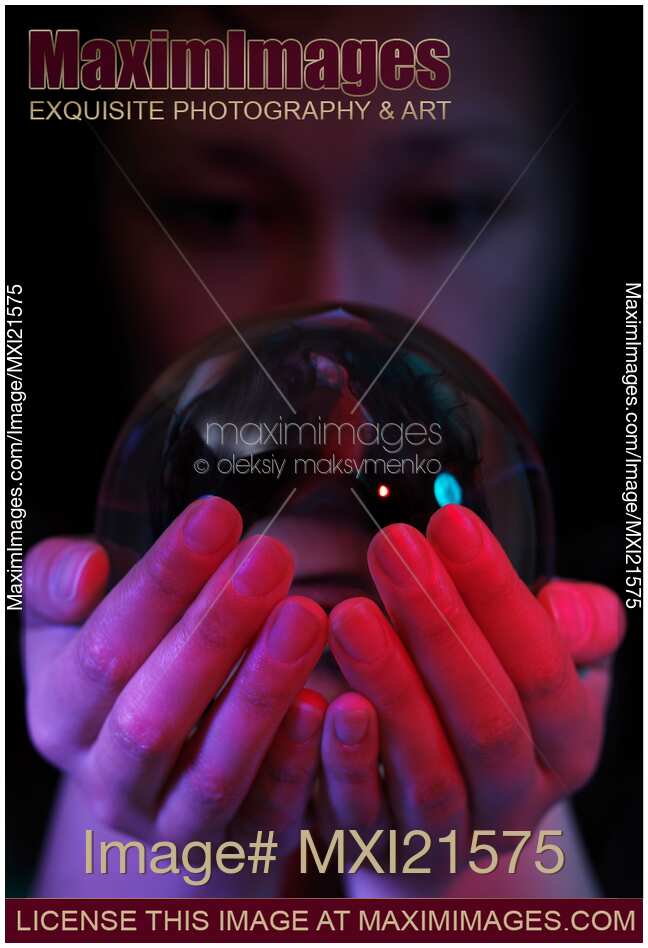 Stock photo Woman with a Crystal Ball MaximImages