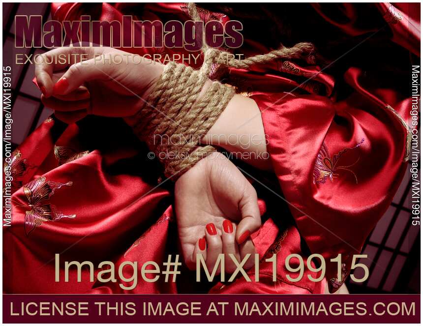 Woman with Her Hands Tied Behind Her Back