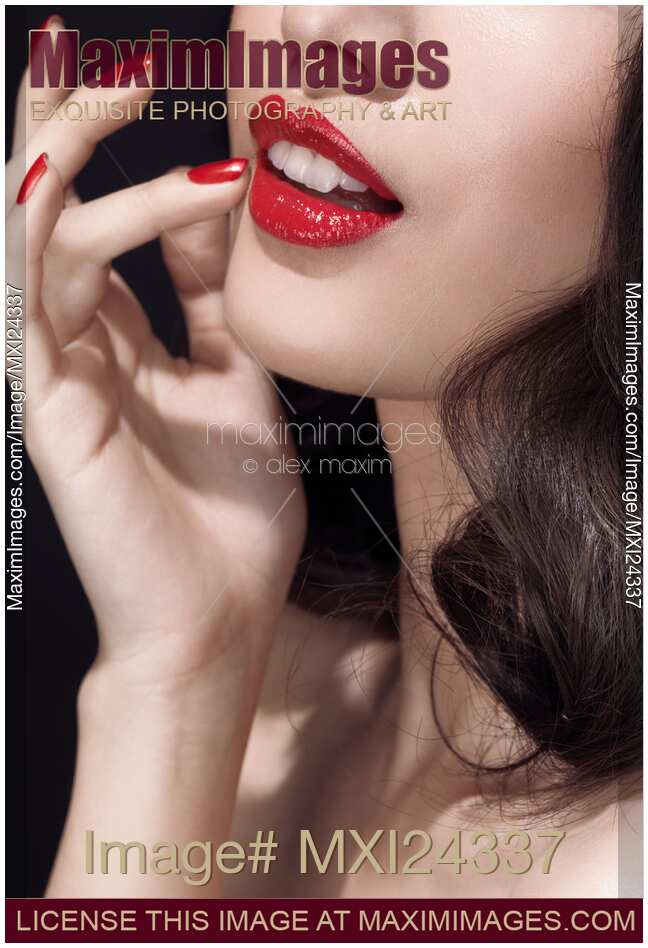 Woman with red lipstick closeup of sensual mouth