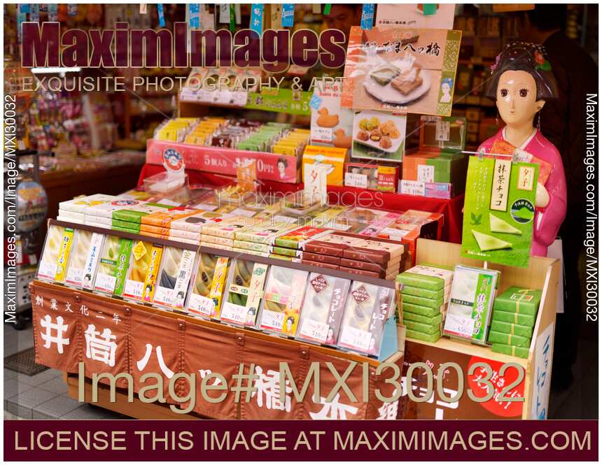 Yatsuhashi triangles with red bean paste Miyagegashi souvenir sweets on store display in Kyoto