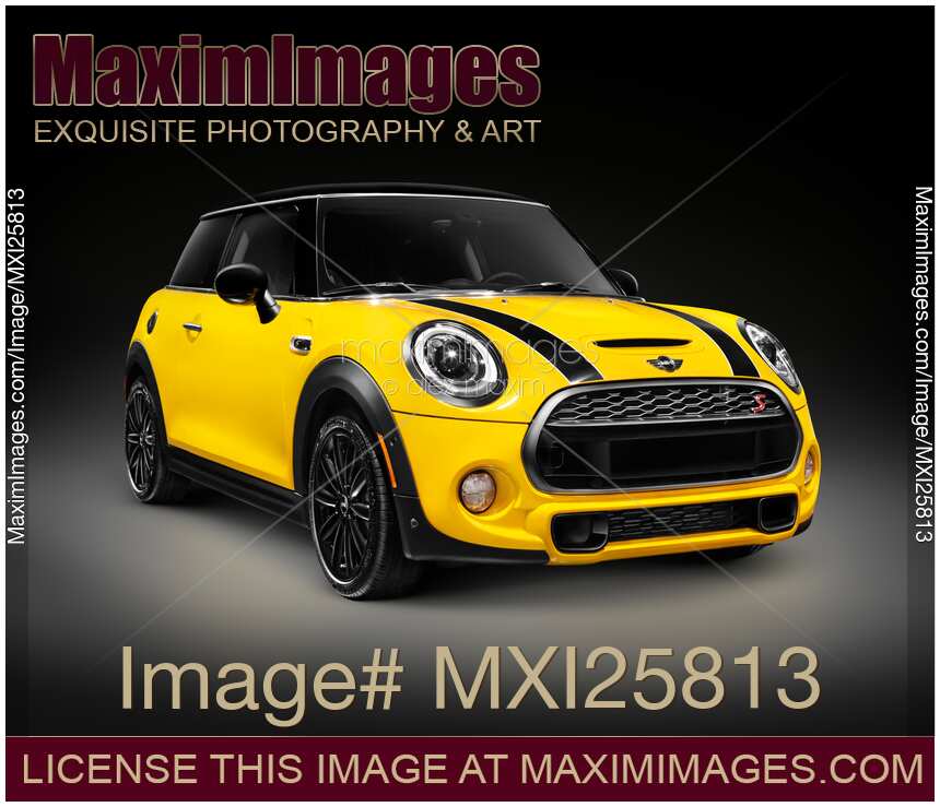 Yellow 2014 Mini Cooper S hatchback car