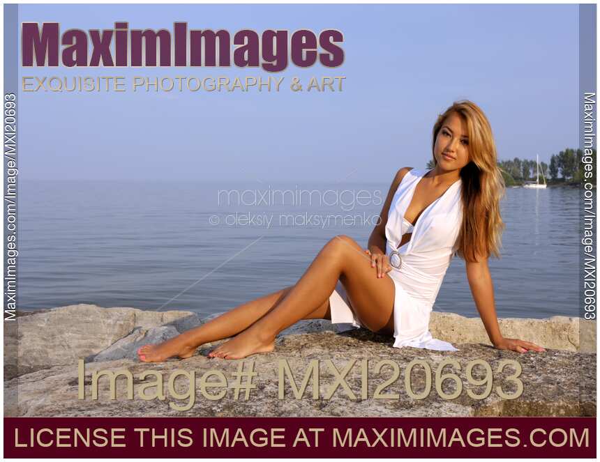 Young Asian Woman on a Shore