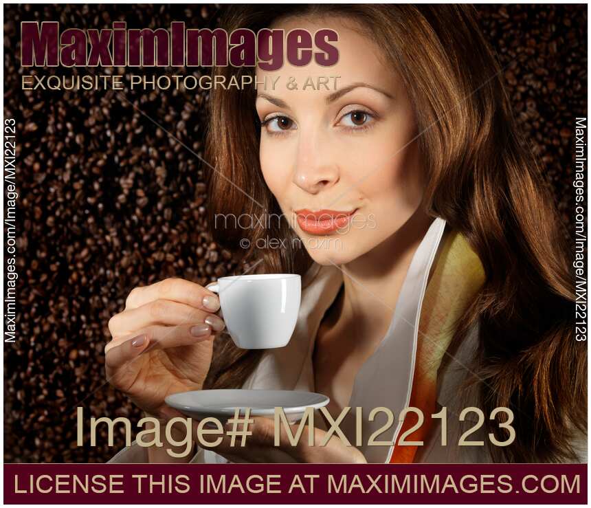 Young Beautiful Woman with a Cup of Coffee