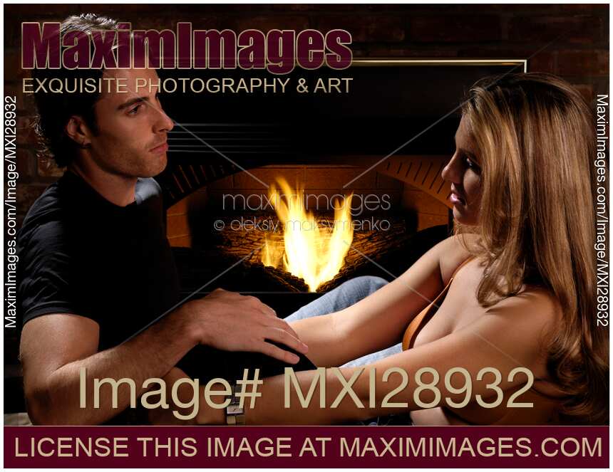 Young Couple at a Fireplace