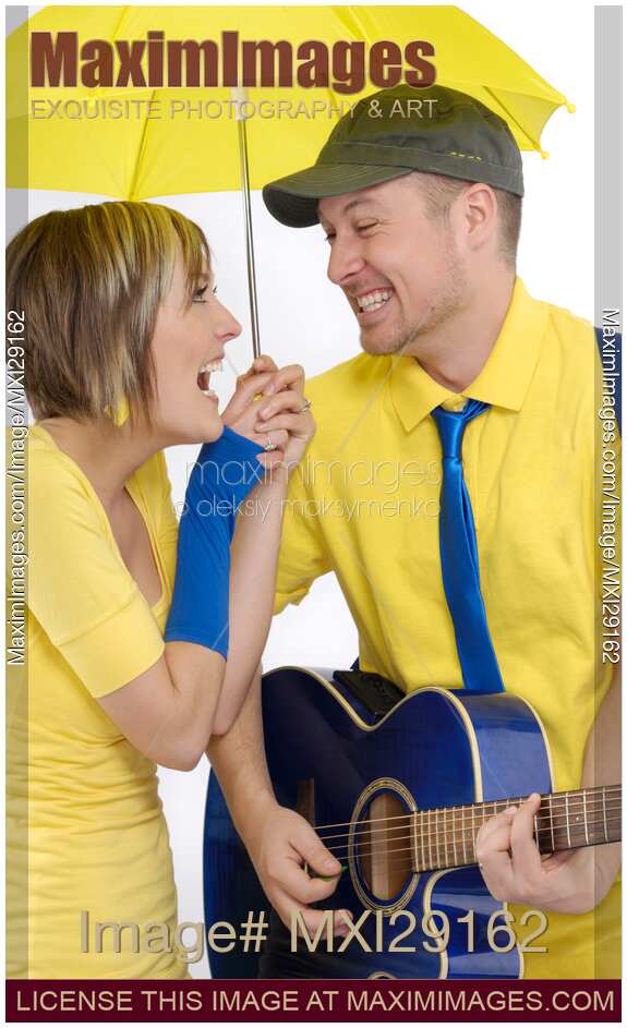 Young Couple Under Umbrella