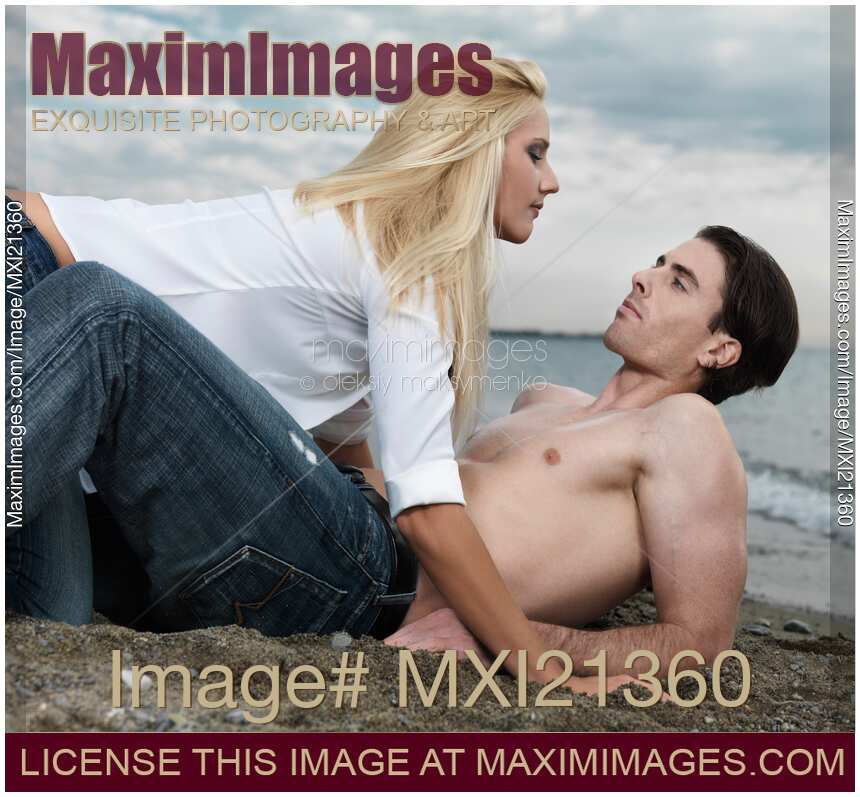 Young Man and a Woman on the Beach