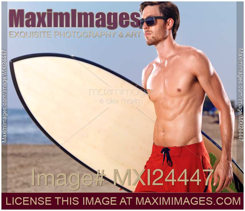 Young man going surfing