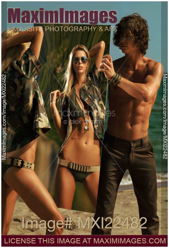 Young Man Holding a Mirror for a Woman