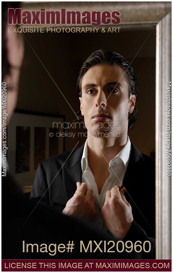 Young Man Looking at a Mirror