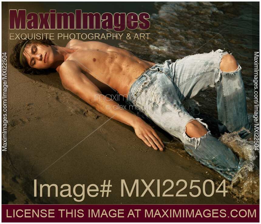 Young Man Lying on the Shore