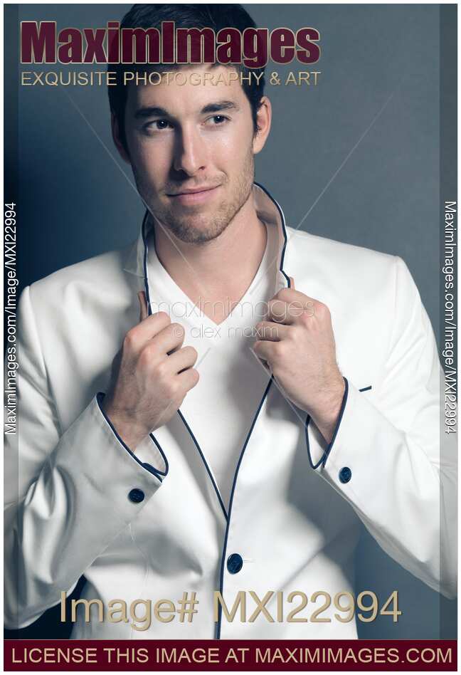 Young Man Wearing White Blazer