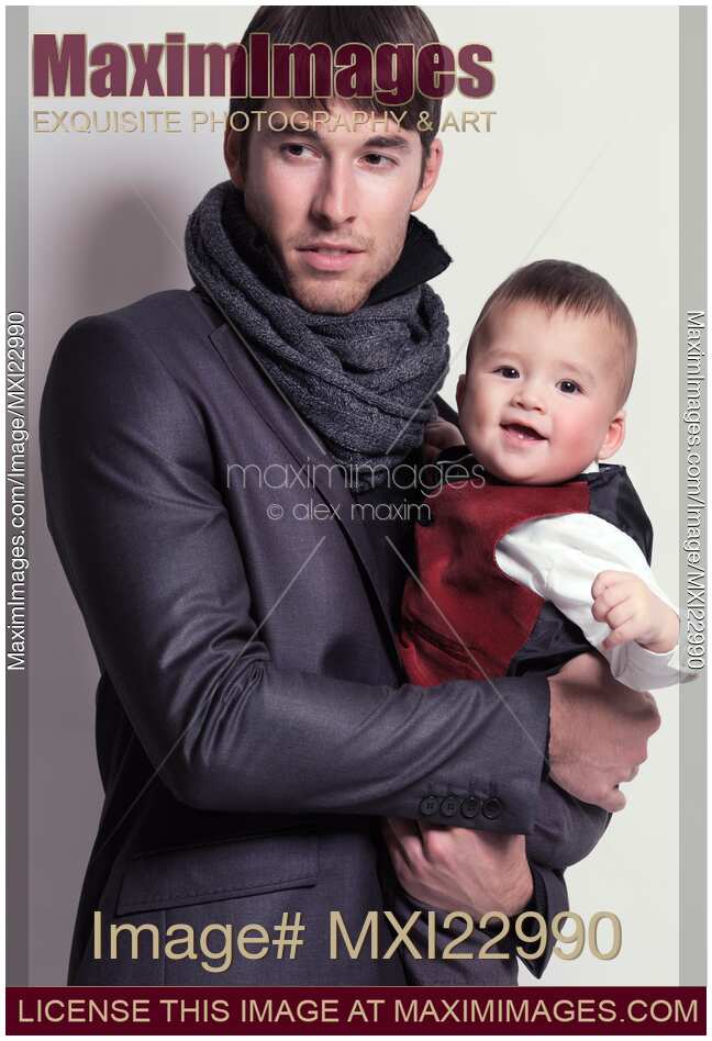 Young Man with a Baby Boy in His Hands