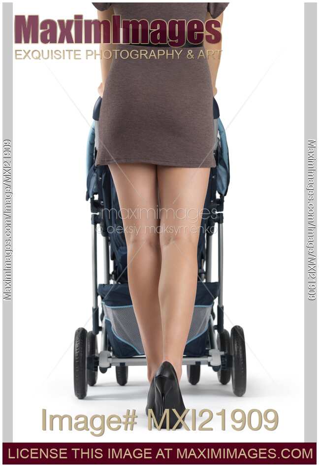 Young Mother with a Baby Stroller