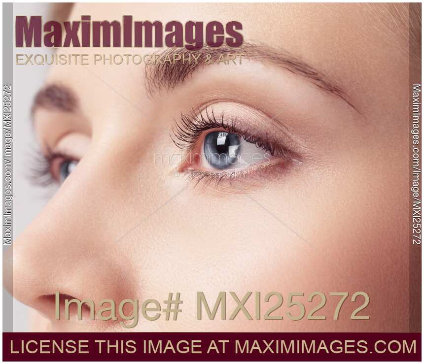 Young woman beautiful blue eyes closeup