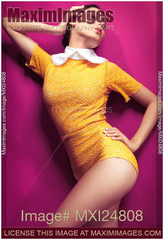 Young woman colorful vintage style fashion photo