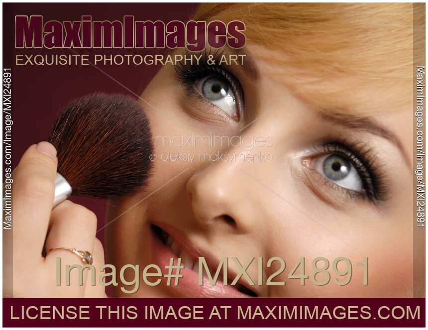 Young Woman Having Make-up Applied