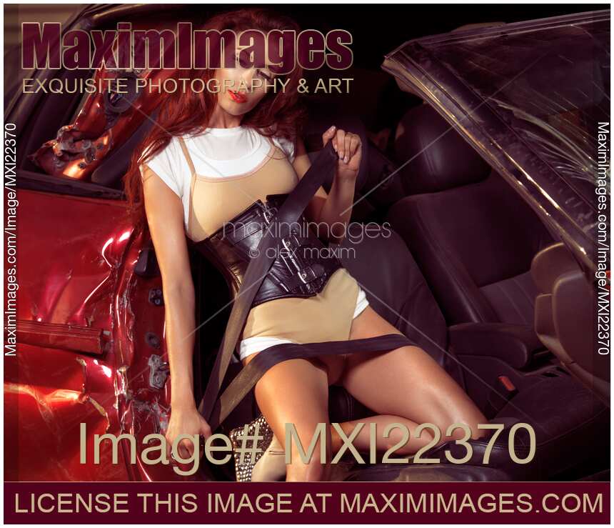 Young Woman in a Crashed Car