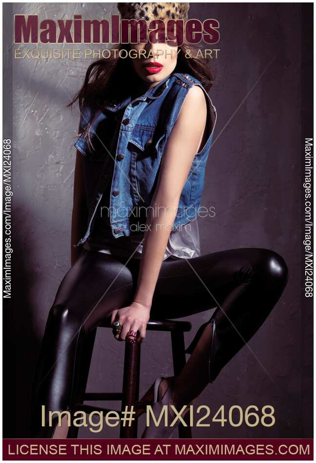 Young woman in edgy grunge fashion style clothing