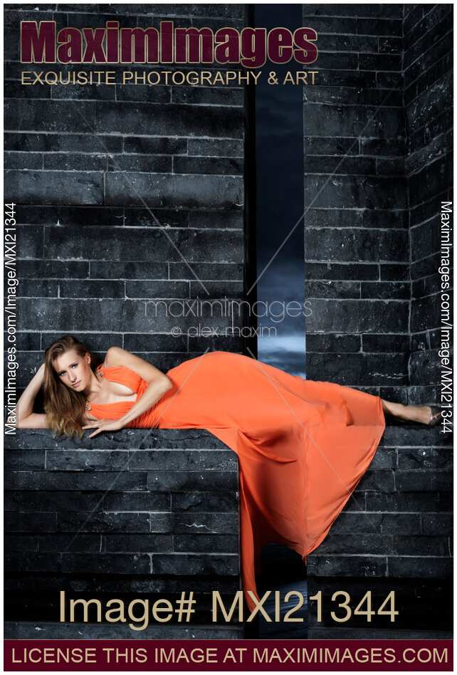 Young Woman in Long Orange Dress