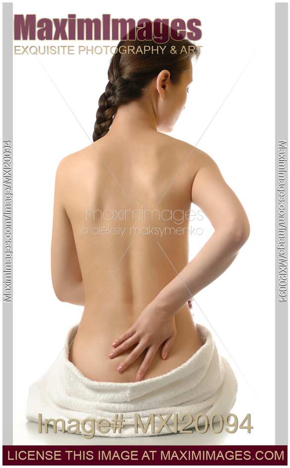Young woman rubbing her back Backache concept