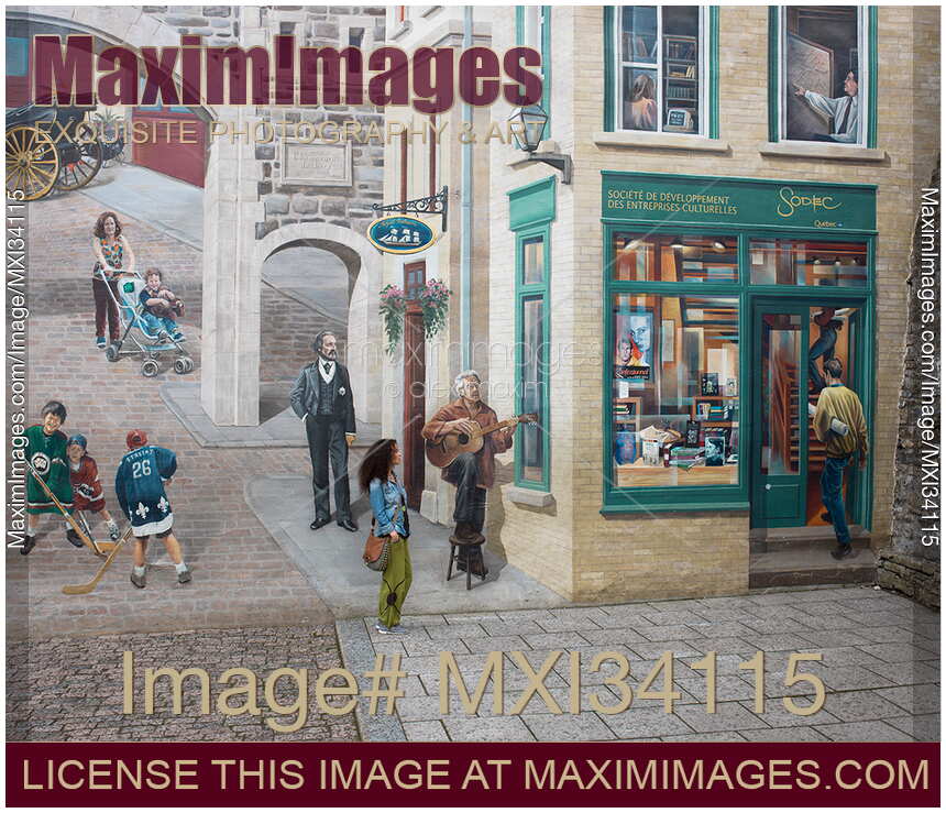 Young woman standing by the wall mural La Fresque des Québécois in Old Quebec City