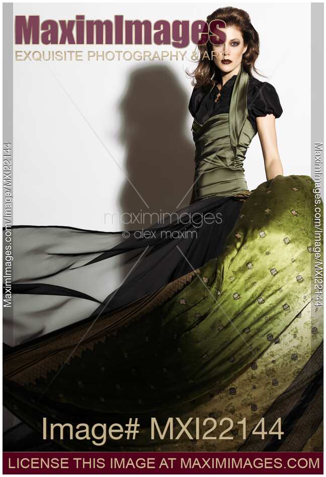 Young Woman Wearing a Long Flying Dress