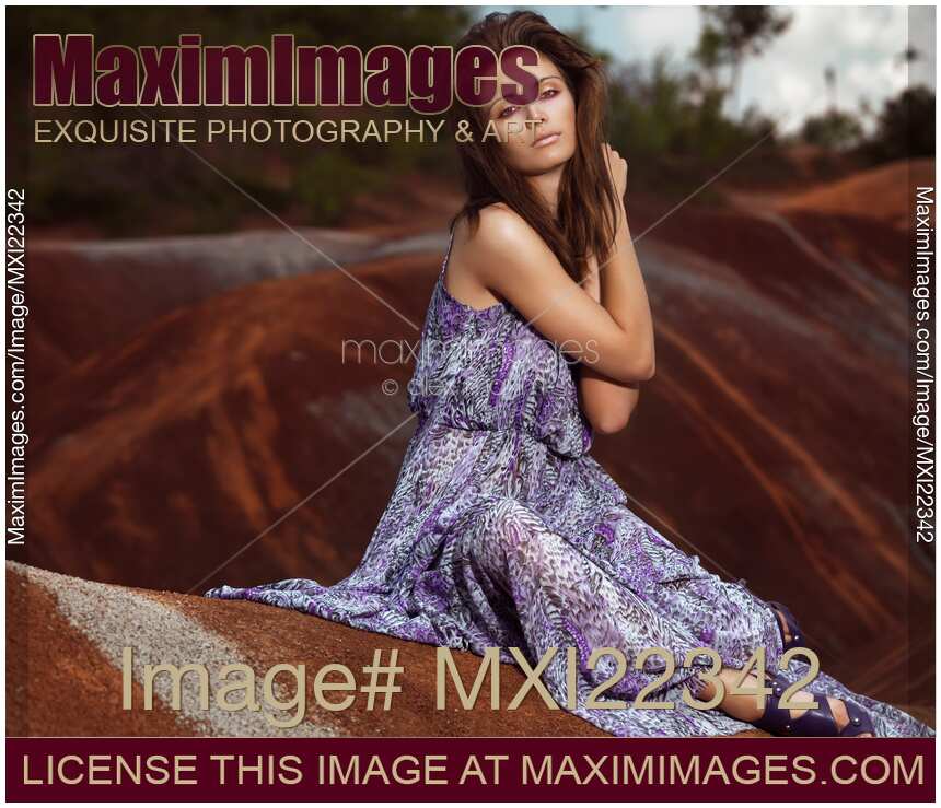 Young Woman Wearing Long Flare Dress