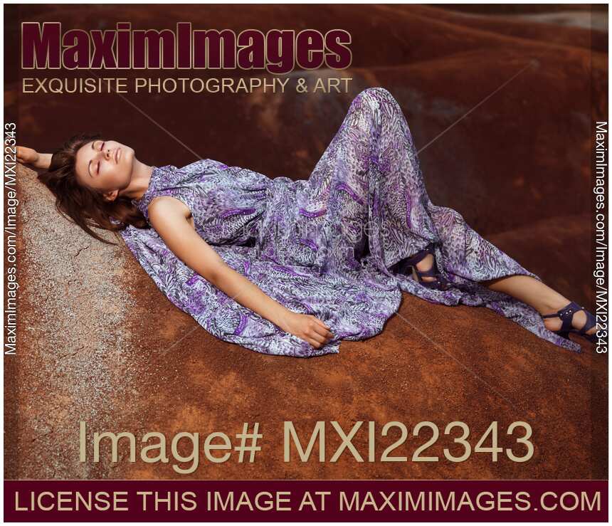 Young Woman Wearing Long Flare Dress