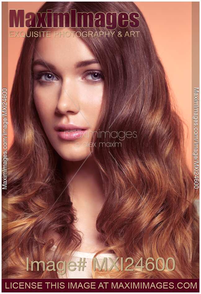 Young woman with beautiful long brown hair