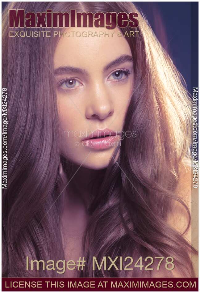 Young woman with long light brown hair
