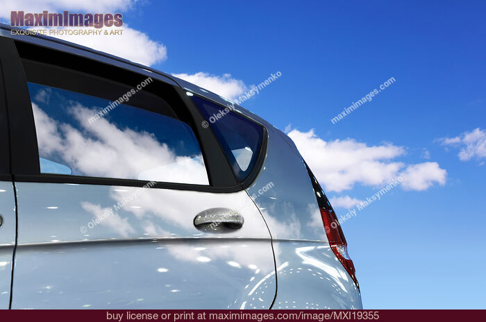 Stock photo of Car Under Blue Sky Buy commercial use license at MaximImages