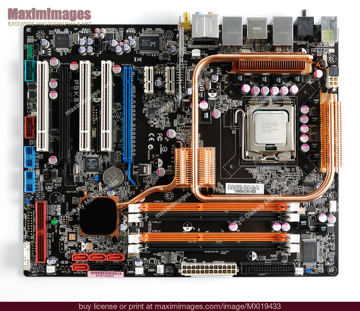 Stock photo of Computer Motherboard with Intel CPU Buy commercial use license at MaximImages