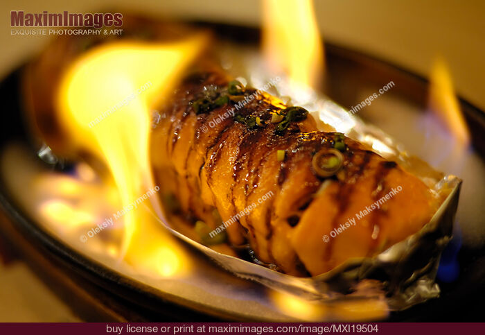 Stock photo of Burning Sushi Volcano Roll Buy commercial use license at MaximImages