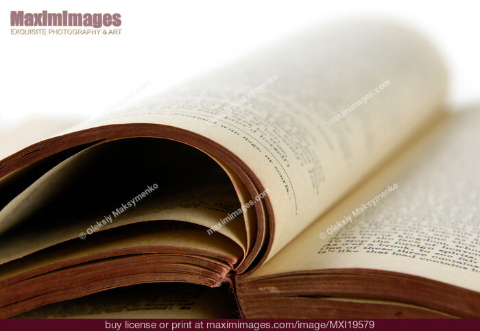 Stock photo of Old Open Tattered Book Buy commercial use license at MaximImages