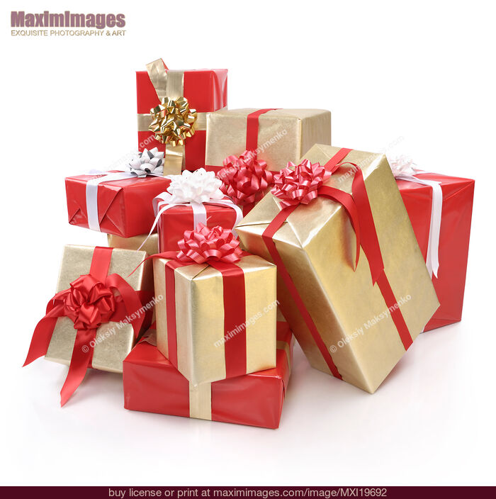 Pile of Christmas gifts wrapped in red and gold. Stock Photo MXI19692