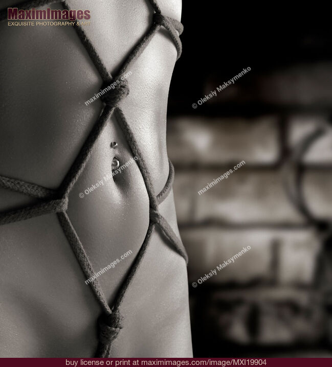 Stock photo of Woman Stomach with Artistic Rope Bondage Shibari Buy commercial use license at MaximImages