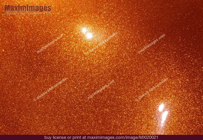 Stock photo of Orange Glitter Paint Buy commercial use license at MaximImages