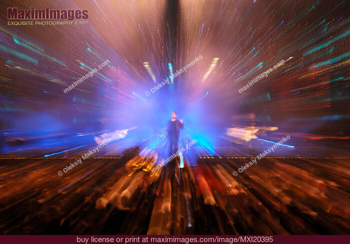 Stock photo of Music Band Performing on a Stage Buy commercial use license at MaximImages