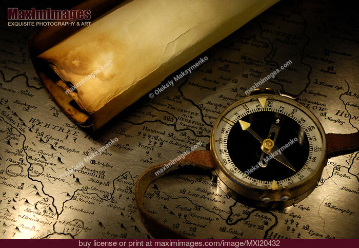 Stock photo of Compass and a Map Buy commercial use license at MaximImages