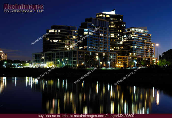 Stock photo of Condo Buildings at Night Buy commercial use license at MaximImages
