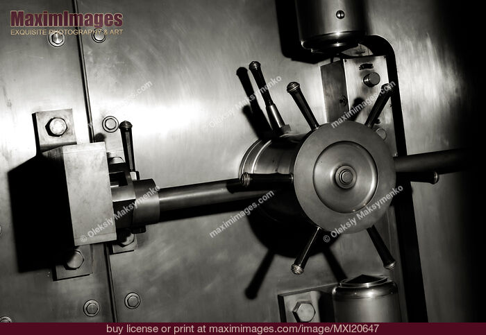 Stock photo of Bank Vault secure door lock Buy commercial use license at MaximImages