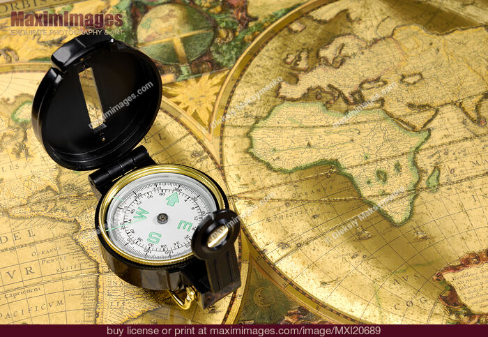 Stock photo of Compass on a World Map Buy commercial use license at MaximImages