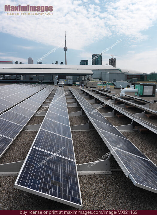Stock photo of Solar Panels on a Roof Buy commercial use license at MaximImages