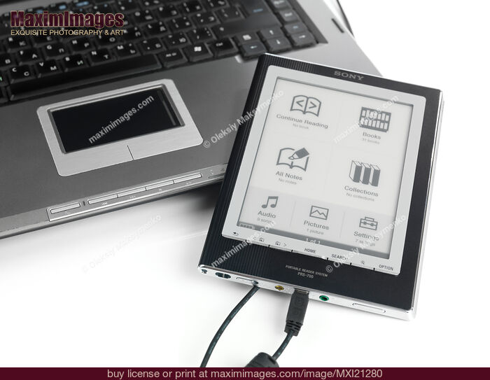 Stock photo of Sony Reader Connected to a Laptop Buy commercial use license at MaximImages