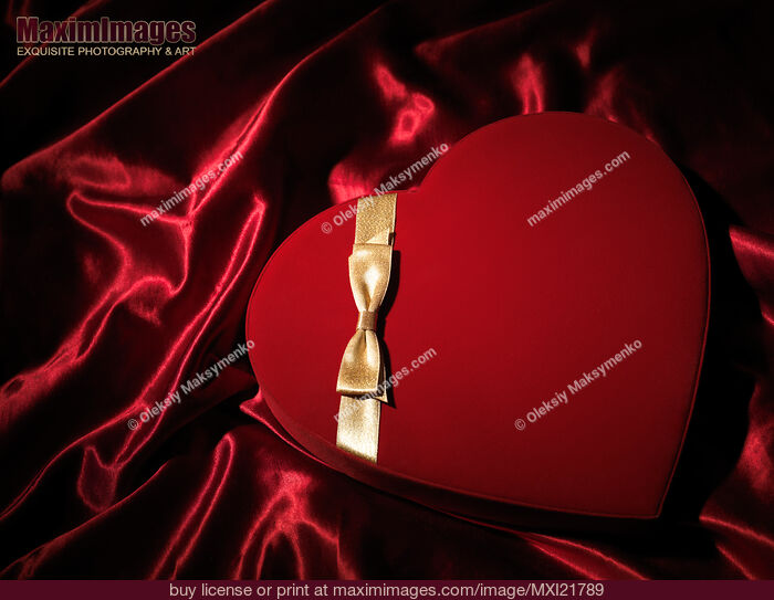 Stock photo of Red Heart-Shaped Gift Box Buy commercial use license at MaximImages